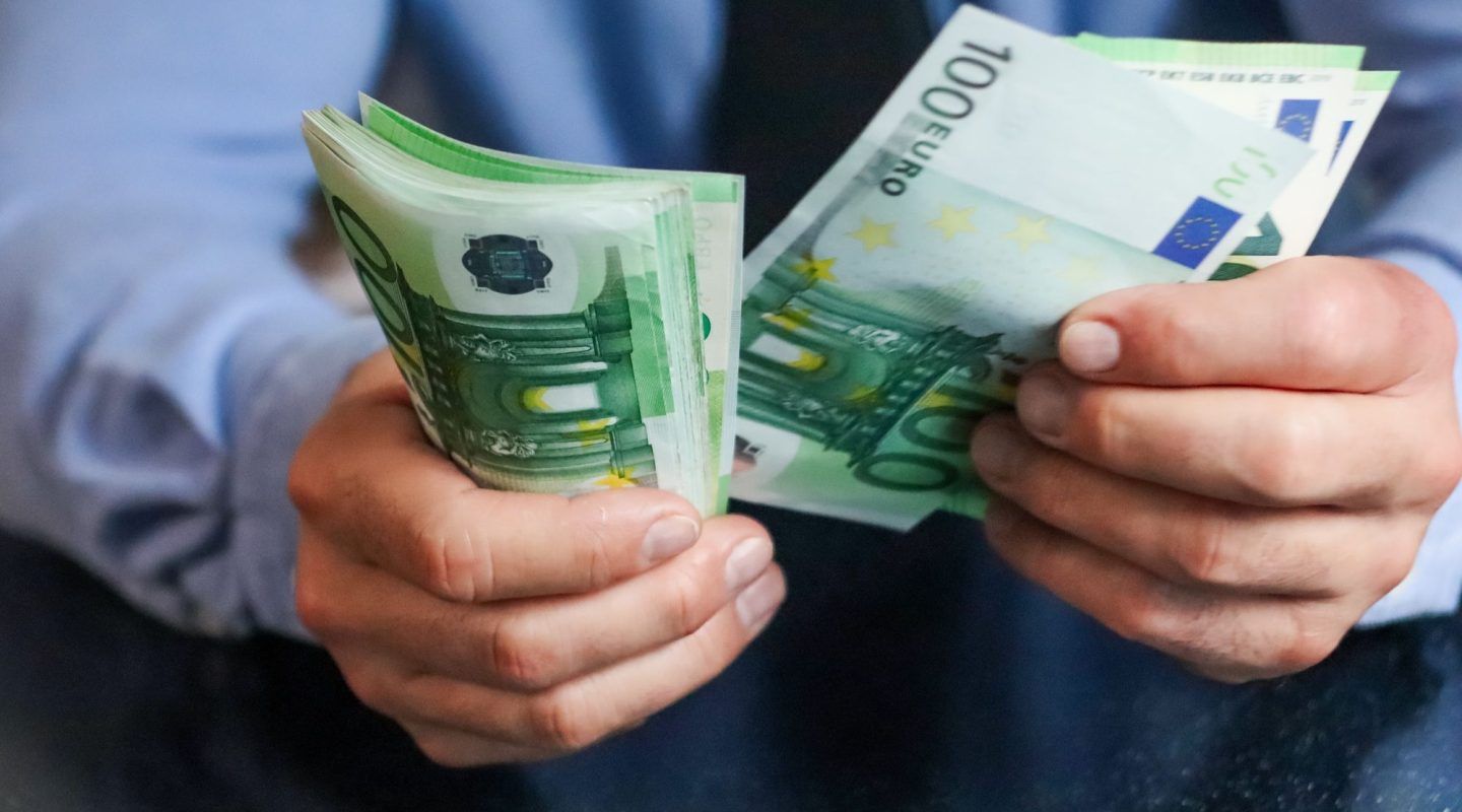 Money. Hands holding money, euro, euros, counting money, saving currency, rich,cash, hundreds,hand